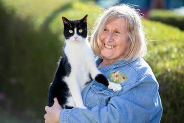 Genevieve Moss from Derbyshire, with her pet cat Zebby, who has been announced National Cat of the Year in the Cats Protection National Cat Awards