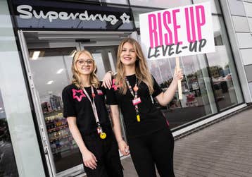 Apprentices Jade Rebbeck, aged 21, and Ashlee Maher-Danie, aged 17, take part in Superdrug's 'Rise Up to Level Up' apprentice recruitment campaign in Basildon. The campaign, which is backed by the British Retail Consortium, pledges to employ 500 apprentices across UK this academic year, double intake over the next three years and focus on five key areas where unemployment amongst the young is high. Picture date: Monday August 21, 2023. PA Photo.