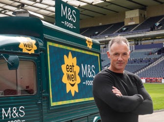 EDITORIAL USE ONLY Scottish Footballing legend, Christian Dailly pictured beside the Marks and Spencer Eat Well Foodtruck inside Hampden Scotlands National Football Stadium. Picture date: Thursday August 24, 2023. PA Photo.