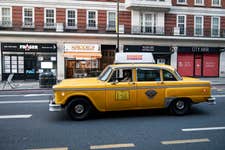 The DUNKIN' UK yellow cab, which features a photobooth inside, drives down Baker Street to announce the company's rapid expansion in the UK capital. Participants diverted to the cab from other coffee shops will receive a voucher for a year’s supply of DUNKIN’ coffee and donuts.