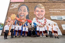 EDITORIAL USE ONLY (Right to left) Olympian Katarina Johnson-Thompson, artist Paul Curtis and Paralympian Jack Hunter-Spivey with pupils during a visit of St Mark’s Catholic School in Liverpool to announce a new landmark partnership between British Gas, Team GB and Paralaympics GB. Picture date: Monday October 9, 2023. PA Photo. The pair unveiled a mural by Liverpudlian street artist, Paul Curtis, as the 5-year partnership kicks off with a free programme for schools, Get Set for Positive Energy, to inspire children to use their positive energy to drive change and build healthy habits for the future.