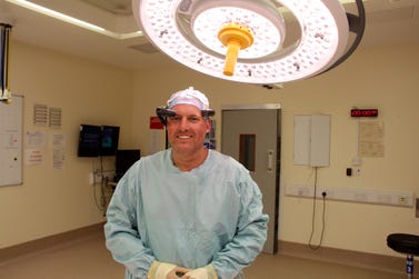 Nick Cooke, consultant in trauma and orthopaedics at North Tees and Hartlepool NHS Foundation Trust, wears a RealWear healthcare wearable solution to accommodate a diverse group of students, including those training to be paramedics, radiographers and physiotherapists. (Photo: Business Wire)