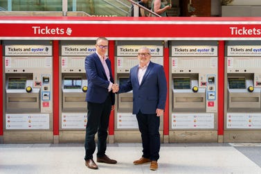 (L-R) Matthew Thomas - Managing Director UK & Ireland, TNS Payments Market and Ken Cameron - Managing Director Fare Collection Systems at Scheidt & Bachmann UK. (Photo: Business Wire)