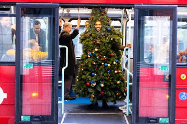 EDITORIAL USE ONLY A person dressed up as 6ft Christmas tree on on a London bus ahead of Tesco’s Christmas ad launching next week. Issue date: Thursday November 9, 2023. PA Photo. Research from the retailer found that nearly a third of people find the countdown to Christmas more exciting that Christmas Day itself.