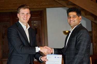 Lorenz Frey-Hilti, Director, Emil Frey Group & Sudarshan Venu, Managing Director, TVS Motor Company announcing the partnership (Photo: Business Wire)