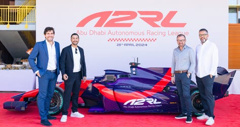 ASPIRE’s team with the newly debuted autonomous Super Formula SF23 racing car in Abu Dhabi (Photo: AETOSWire)