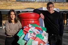 Charity ambassadors Louis Theroux and Mandip Gill visit Shelter’s ‘Dear Santa’ installation at King’s Cross Station, which aims to highlight the record number of children without a place to call home this Christmas. Picture date: Tuesday November 28, 2023. PA Photo. The installation, which features a giant letter from a real child who has been supported by Shelter, comes as the latest government data reveals that, in England, the number of households with children who have become homeless in the past year is at a record high.