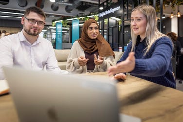 Software engineering trainees working in BAE Systems’ digital, cyber and intelligence business. (Photo: Business Wire)