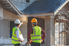 Workers outside a new property under construction