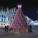 Pictured_ Giant Furby adorned trees appear to take over London Regents Street, Paris' Boulevard Haussmann (Place Diaghilev), and Berlin's Brandenburg Gate in videos appearing online