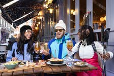 EDITORIAL USE ONLY (left to right) Athina, Alex, and Yewande dine at Côte Brasserie wearing full ski gear ahead of the restaurant chain introducing the offer of a free drink to anyone wearing slope-appropriate attire to celebrate its new Alpine menu. Issue date: Monday January 22, 2024. PA Photo. Côte Brasserie diners who order a main meal from the à la carte menu whilst wearing ski clothing or accessories, and say ‘après anything’ can take advantage of the limited time offer, valid from January 29 until February 29.