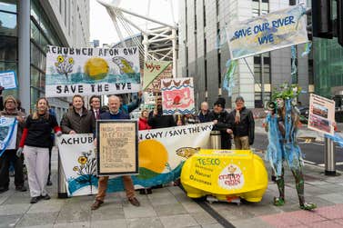 River Action, Feargal Sharkey and Save the Wye outside Cardiff Civil Justice Centre River campaigner Feargal Sharkey holding the 'Universal Declaration of River Rights' Founder and Chair of River Action Charles Watson holding the 'Universal Declaration of River Rights'