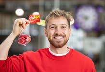 EDITORIAL USE ONLY Sam Thompson encourages commuters to ‘share a giggle’ at Waterloo station, London, ahead of this years Red Nose Day, as Babybel celebrates 25 years of sharing giggles with Comic Relief. Issue date: Monday February 26, 2024. A new study from Babybel found that sharing a giggle and doing a good deed are the things that make Brits feel best. The brand has raised over £1.75million for Comic Relief through its 25-year partnership with the charity.