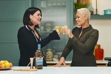 Monica and Jessie with a cocktail
