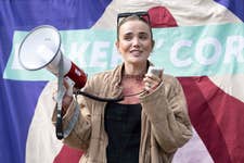 Social media activist Em Clarkson on a soapbox called the ‘pelvic podium’ at Speakers Corner in Hyde Park, London, as part of a campaign to raise awareness of the UK’s maternal pelvic health crisis. Picture date: Thursday April 18, 2024. PA Photo. The campaign comes as women's health brand Elvie highlights that the Government’s deadline to introduce specialist perinatal pelvic health services across England has passed without meeting its target, finding that a third of the country is still without women's pelvic health services.