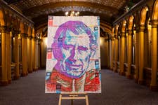 EDITORIAL USE ONLY Artist Nathan Wyburn unveils his portrait of King Charles III made of only bingo dabbers and bingo tickets, commissioned by Buzz Bingo to celebrate the first year of the King's reign, London. Issue date: Tuesday April 30, 2024. PA Photo. Created with 80 bingo tickets and 12 dabbers, the portrait was unveiled at Buzz Bingo in Tooting yesterday ahead of the coronation anniversary this Bank Holiday Monday May 6th.