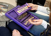 EDITORIAL USE ONLY A view of Memory Bar Boxes following requests from people caring for those living with dementia for nostalgic packaging to support reminiscence activities, Cadbury has partnered with Alzheimer’s Research UK to release ‘Memory Bar Boxes’. Issue date: Tuesday May 14, 2024. PA Photo. The boxes aim to stimulate conversation and support memory activities for people living with dementia and their loved ones. 3,000 boxes will be distributed to care homes and Alzheimer’s Research UK supporters throughout Dementia Action Week this week, with 1,000 available for those caring for loved ones at home.