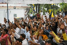 Tougher times for India's democracy under Modi's reign. Aam Aadmi Party (AAP) leader and chief minister of Delhi Arvind Kejriwal is greeted by cheering supporters a day after his release on bail by India's top court. A top opponent of Indian Prime Minister Narendra Modi warned that his country was facing "dictatorship". (Photo by Arun Sankar/AFP)