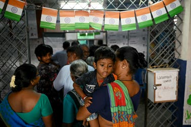 People stand in a queue to cast their votes at a polling station as voting starts in the first phase of India's general election in Chennai, capital of India's Tamil Nadu. The country has recently seen a decline in democratic accountability, according to the 2024 Berggruen Governance Index. (Photo by R. Satish Babu / AFP)