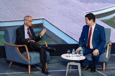 Mr. N.R. Narayana Murthy (L) and Dr. Truong Gia Binh (R) share a conversation regarding “Accelerating Values" (Photo: Business Wire)