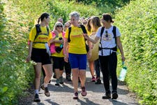 EDITORIAL USE ONLY Darcy and Maxine Laceby with Emma Willis during Absolute Collagen’s ‘Map My Baps’ challenge, a 21km trek through the Chilterns to drive awareness and support for breast cancer charity, Coppafeel. Issue date: Sunday May 26, 2024. PA Photo. The half marathon route took the shape of a pair of breasts. Photo credit should read: Anthony Upton/PA Media Assignments