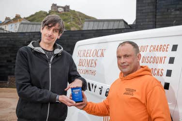 Award-winning comedian Darren Walsh presents Matt Triboulliard, Owner of Surelock Homes, with the trophy for Simply Business’ Britain’s Best Small Business Name 2024 competition.