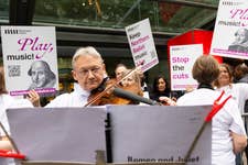 The Northern Ballet Sinfonia performed for onlookers and passers-by outside London Sadler’s Wells Theatre ahead of the first performance of Northern Ballet’s Romeo and Juliet, to protest against plans to replace the orchestra with recorded music. Picture date: Tuesday May 28, 2024. PA Photo. The demonstration, organised by the Musicians’ Union (MU), results from Northern Ballet’s plans to replace the musicians in its orchestra with recorded music for its touring productions.