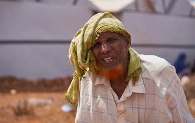 In Somalia, hundreds of thousands of people, like 73-year-old Jimcale, have been displaced by a cycle of conflict, drought, and flooding