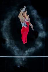 Daiki Hashimoto at the 2023 Artistic Gymnastics World Championships by Eric T'Kindt, A new superhero? The perfect match between a spotlight and a head by Isaac Morillas, Duck Dive by Ryan Pierse