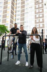 Juan Lopez, founder of Raza Sana, Marc Diaper, CEO of Gymbox, Hannah Curtis Nunn, Group Fitness Director of Gymbox at the unveiling of the Northumberland Park Street Gym, developed by not-for-profit organisation Raza Sana and funded by Gymbox and Haringey Council, London, which opens to the public today. Issue date: Tuesday July 16, 2024. PA Photo. The new community gym in Northumberland Park, Tottenham Ð a neighbourhood where almost 2 in 10 residents are involved in crime Ð will provide a space for all ages to practise everything from low-impact exercise through to calisthenics. Raza Sana will work with the local community to provide them access to Ô1st RepÕ; a programme dedicated to helping disadvantaged young people.