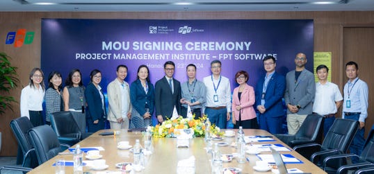 The signing ceremony was attended by FPT Software SVP & CDO Vu Tien Dat, FPT Software CHRO Nguyen Tuan Minh, FPT Software Academy Deputy Director Nguyen Quoc Dong, President & CEO, PMI Pierre Le Manh, Regional Managing Director - Asia Pacific, PMI SoHyun Kang, and other distinguished guests. (Photo: Business Wire)