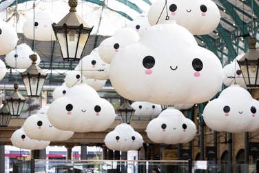 EDITORIAL USE ONLY “Little Cloud World”, a new large-scale installation by Los Angeles-based artist duo ‘FriendsWithYou’, is unveiled in Covent Garden’s Market Building. Picture date: Wednesday July 31, 2024. PA Photo. Over 40 floating clouds, each measuring over 4ft in height, fill the South Hall, creating a ‘portal into a happy place’.