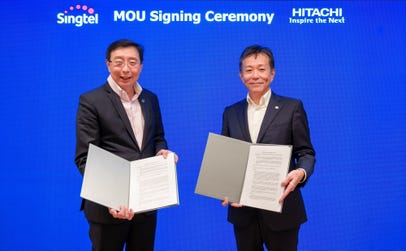 Hitachi Singtel MOU Signing Ceremony (Photo: Business Wire)