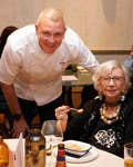 EDITORIAL USE ONLY Head development chef, Phil Rimmer with a guest at the UK’s first dedicated fine dining experience for people with eating, drinking and swallowing difficulties, known as Dysphagia, at Kapara in Soho, London. Picture date: Wednesday September 4, 2024. PA Photo. Diners were given a free lunchtime meal prepared by Wiltshire Farm Foods’ with the menu featuring a variety of puréed meals, giving people with the condition a rare opportunity to enjoy a texture modified meal out with loved ones, friends, and carers.