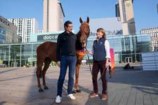 EDITORIAL USE ONLYRacehorse Chase The Wind stands with trainer Jo Foster and presenter Vernon Kay outside Media City in Salford to celebrate National Racehorse Week. Picture date: Friday September 6, 2024. PA Photo. National Racehorse Week is a nationwide annual celebration of the racehorse, with racing training yards, studs and aftercare centres across the country hosting variety of events.