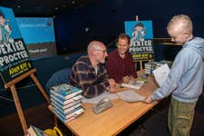 EDITORIAL USE ONLY Former doctor and author Adam Kay and illustrator Henry Paker during a special launch event for young patients at Chelsea & Westminster Hospital MediCinema to celebrate the publication of their children’s book, Dexter Procter, The 10-Year-Old Doctor. Issue date: Thursday September 12, 2024. PA Photo. The event is the first in a series of four in-hospital events to support work of charities MediCinema and Starlight in bringing play and entertainment into hospitals. Puffin mini-libraries, copies of Dexter Procter and specially themed play-kits will also be donated to each hospital as part of the visits.