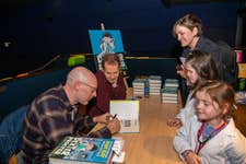 EDITORIAL USE ONLY Former doctor and author Adam Kay and illustrator Henry Paker during a special launch event for young patients at Chelsea & Westminster Hospital MediCinema to celebrate the publication of their children’s book, Dexter Procter, The 10-Year-Old Doctor. Issue date: Thursday September 12, 2024. PA Photo. The event is the first in a series of four in-hospital events to support work of charities MediCinema and Starlight in bringing play and entertainment into hospitals. Puffin mini-libraries, copies of Dexter Procter and specially themed play-kits will also be donated to each hospital as part of the visits.