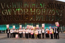 Musicians' Union (MU) members in the Welsh National Opera (WNO) orchestra take part in industrial action ahead of WNO's performance of Rigoletto at the Wales Millennium Centre. Picture date: Saturday September 21, 2024. PA Photo. The members taking Action Short of Strike follows Arts Council of Wales and Arts Council England funding cuts, which has forced WNO management to consider making the orchestra part time and cutting musicians' pay by 15 per cent.