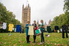 EMBARGOED TO 0001 TUESDAY OCTOBER 1EDITORIAL USE ONLYL-R Executive Head Teacher, Sarah Smith, helps Hygiene Bank CEO, Ruth Brock, and smol Suds in Schools lead, Hilary Strong hang out school uniforms in Westminster as laundry brand smol and charity The Hygiene Bank launch their ‘Clean Up Child Hygiene Poverty’ campaign. Issue date: Tuesday October 1, 2024. PA Photo. Backed by the teachers union NASUWT, the campaign is calling on the government to urgently address the issue of hygiene poverty in its upcoming Child Poverty Strategy following research which shows UK's school staff have spent £40 million of their own money over the past year supporting pupils with hygiene issues