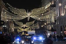 EDITORIAL USE ONLY Members of the public watch the Spirit of Christmas lights switch on across London’s West End, marking the 70th anniversary of Regent Street's festive displays. Picture Date: Thursday November 7, 2024. PA Photo. London West End’s theatre stars and Heart of London Business Alliance also switched on the St Martin’s Lane lights. The Regent Street and St James’s Christmas lights will be turned on every evening until 5th January and St Martin’s Lane, Leicester Square and Coventry Street until 7th January 2025. Photo credit should read: Jack Hall/PA Media Assignments