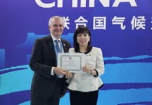 Stewart Maginnis, Deputy Director General, IUCN (on the right), and Sabrina Peng, Chief Sustainability Officer, Ant Group, announcing the partnership in Baku, Azerbaijan, during the 29th Conference of the Parties to the UN Framework Convention on Climate Change (COP29). (Photo: Business Wire)