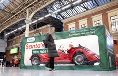 EDITORIAL USE ONLY A red Morgan +4 inside a giant toy box is displayed at Victoria Station in London, as car sharing marketplace Turo releases a survey highlighting the travel concerns of car-less Brits during Christmas. Picture Date: Thursday November 21, 2024. PA Photo. The survey reveals that 51 per cent of those relying on rail to get home for Christmas are worried they won't make it on time, while 52 per cent wish they could see more friends and family during the festive season.