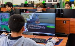 Students engaged in gaining critical future skills using AI Ready Skills (Photo: Business Wire)