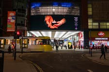 Manchester Arndale Centre lit up purple for the 'Light the Darkness' national moment on Holocaust Memorial Day