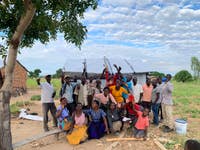 After floods ravaged Malawi, ShelterBox supported people with emergency shelter and held a training session in construction with the local community assembling temporary shelters