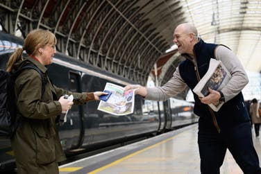 EDITORIAL USE ONLY Mike Tindall hands out copies of Sporting Life to racing enthusiasts at Paddington Station, London in celebration of the start of the Cheltenham Festival. Picture Date: Tuesday, March 11, 2025.