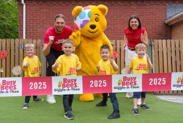 EDITORIAL USE ONLY Mark Ian Hoyle and Roxanne Hoyle, also known as LadBaby and LadBabyMum, with (left to right) Max, 4, Vlad, 4, Jacob, 4, and Harry, 4, at a Busy Bees nursery in Nottingham to launch a nationwide ‘Giggle-A-Thon’, raising funds and awareness for BBC Children in Need’s ‘Make Life Lighter’ mental health campaign. Issue date: Tuesday May 13, 2025. PA Photo. The campaign highlights the nursery’s ongoing commitment to supporting children’s mental health during Mental Health Awareness Week.