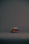 The Pakistan mug, part of the 'Fragments of Hope' Kintsugi tea set, draws its vibrant inspiration from traditional Pakistani truck art. This piece represents Sadia, an award-winning artist and advocate from Pakistan, embodying her journey of resilience after forced displacement. Like the art of Kintsugi itself, it finds beauty and strength in rebuilding, turning fragments into a powerful symbol of hope.