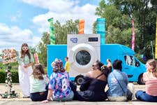 The Wash Pit, British Gas' giant pop-up launderette is rolling into Leigh Delamere Service Station on Monday 30th to clean up the country’s dirtiest festival gear and save parent's energy - for the home and for themselves