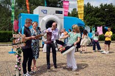 The Wash Pit, British Gas' giant pop-up launderette is rolling into Leigh Delamere Service Station on Monday 30th to clean up the country’s dirtiest festival gear and save parent's energy - for the home and for themselves